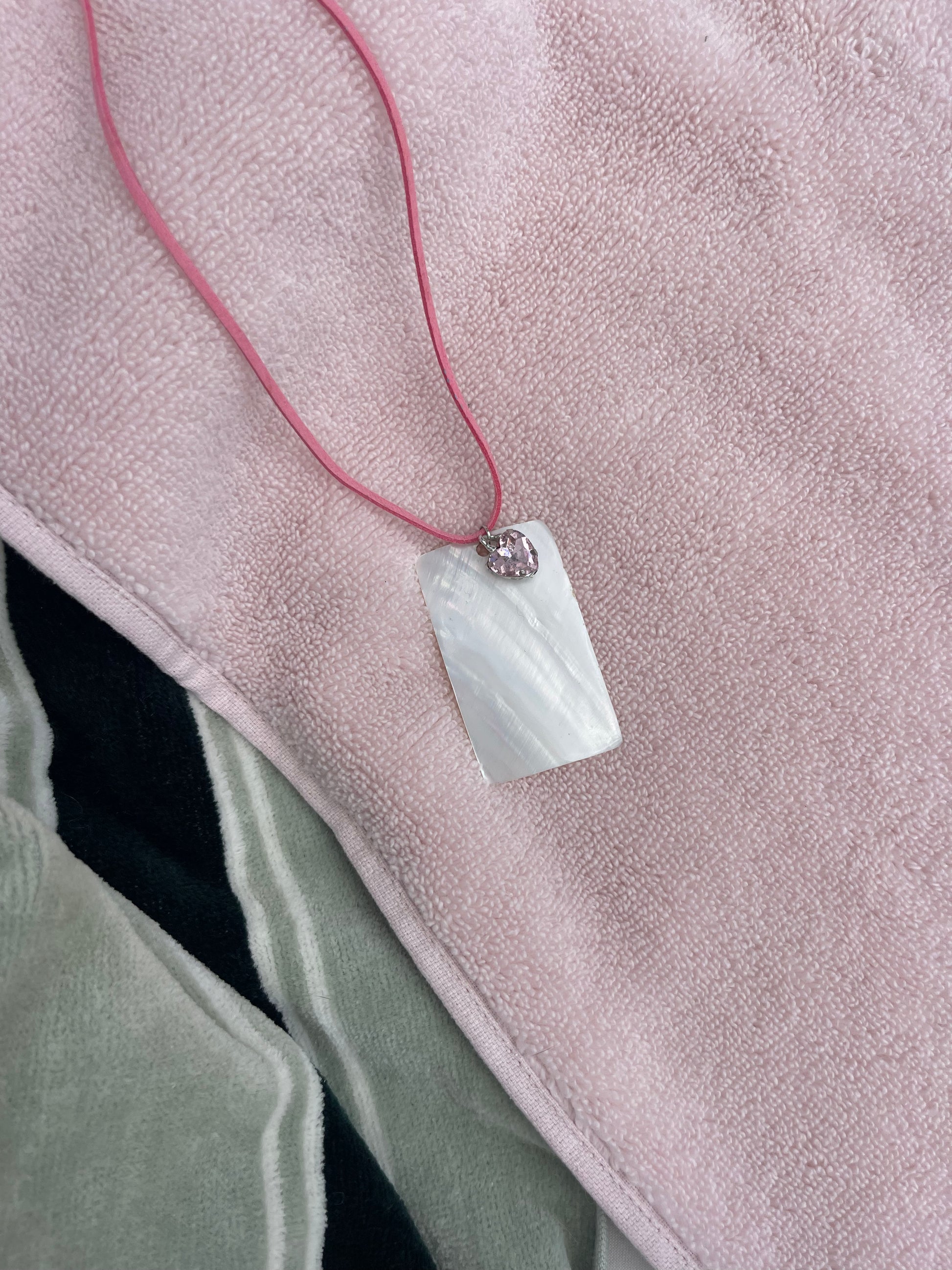 Rectangle shell on pink leather