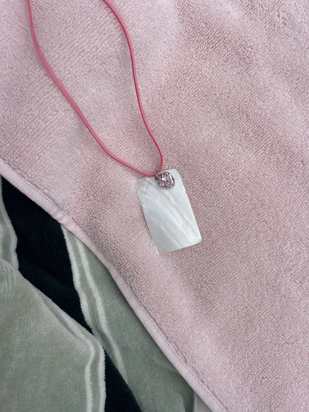 Rectangle shell on pink leather